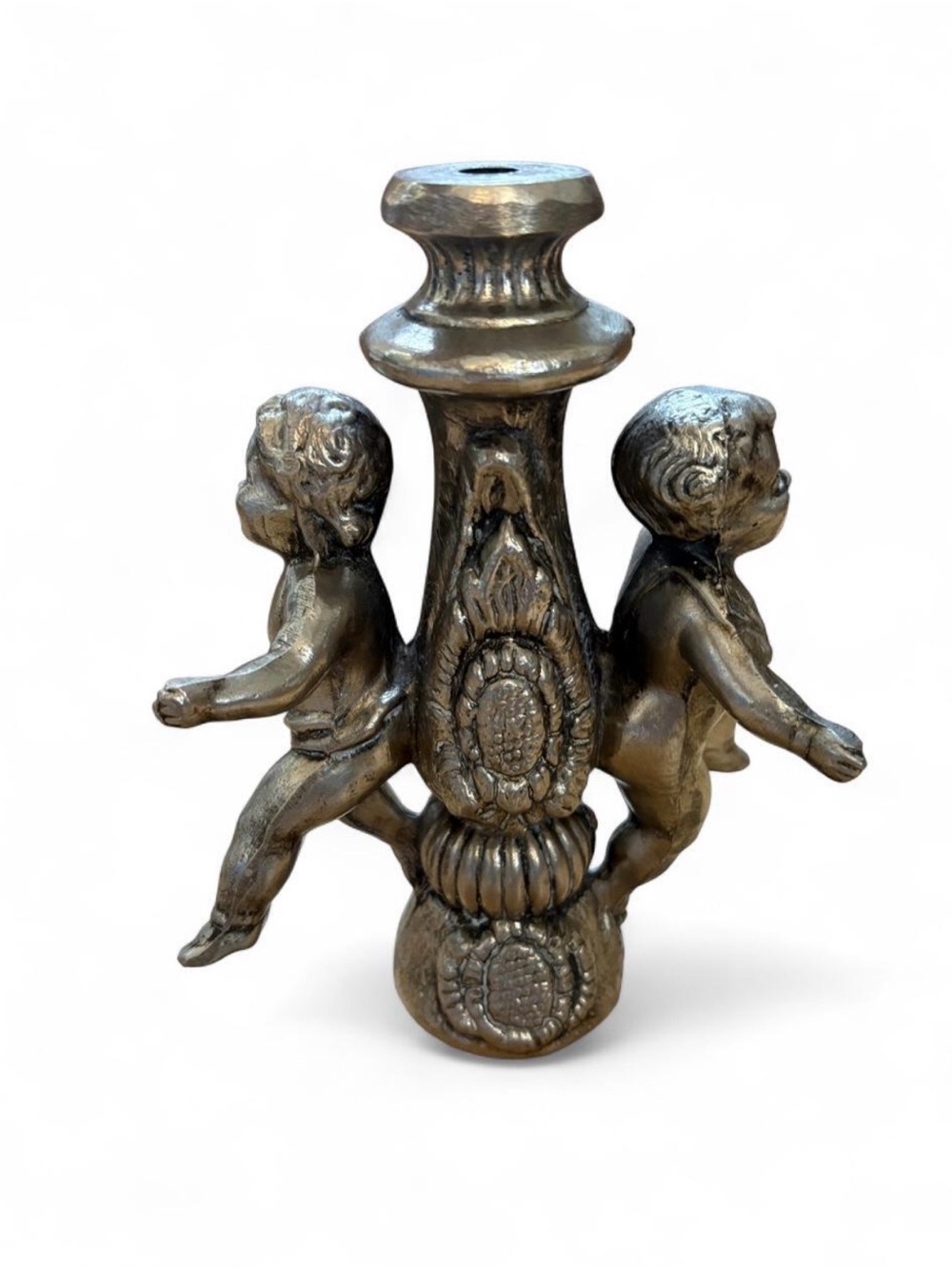 Silver candlestick with cherub design